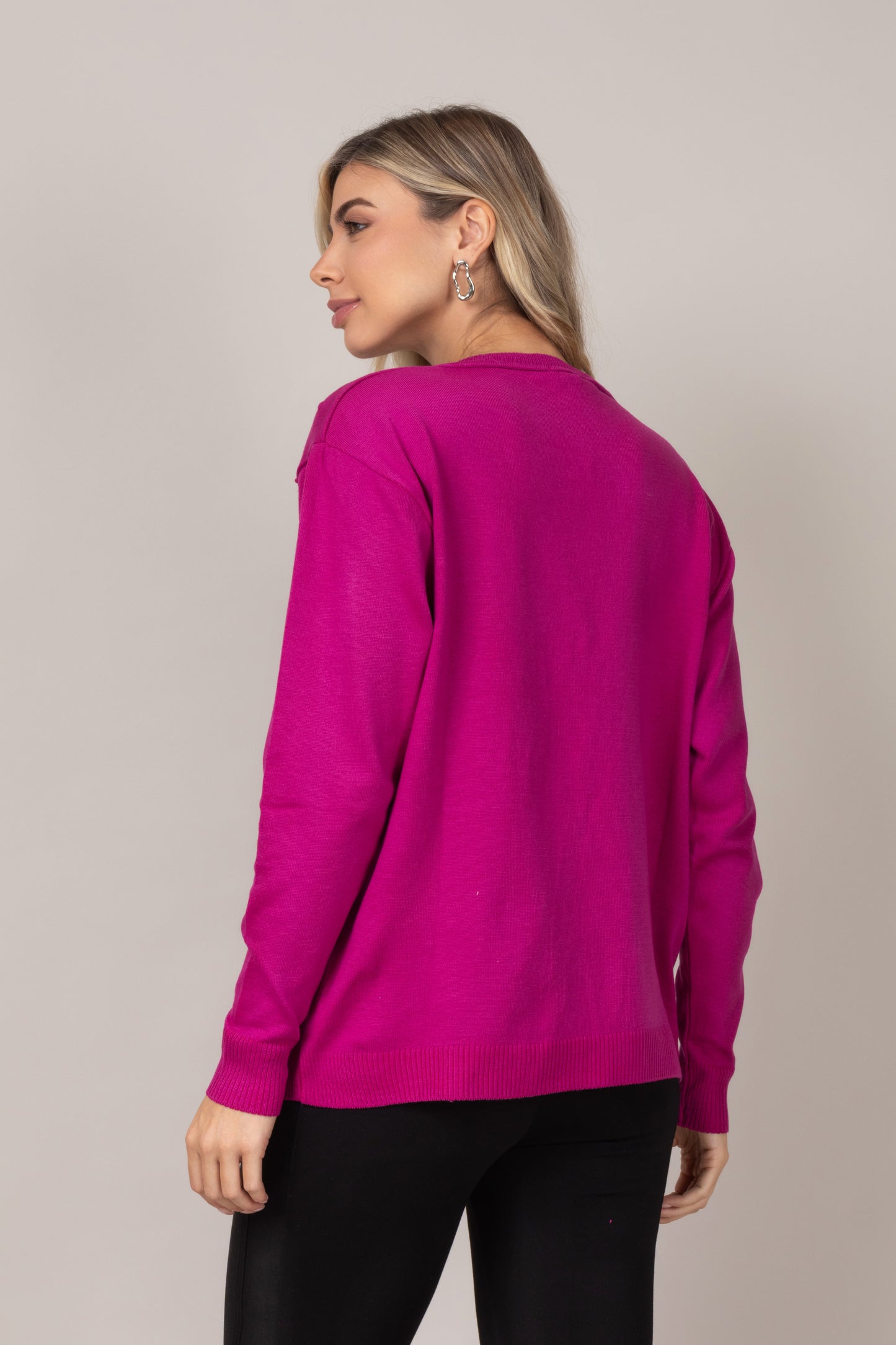 Blusa em tricot com poá em relevo magenta