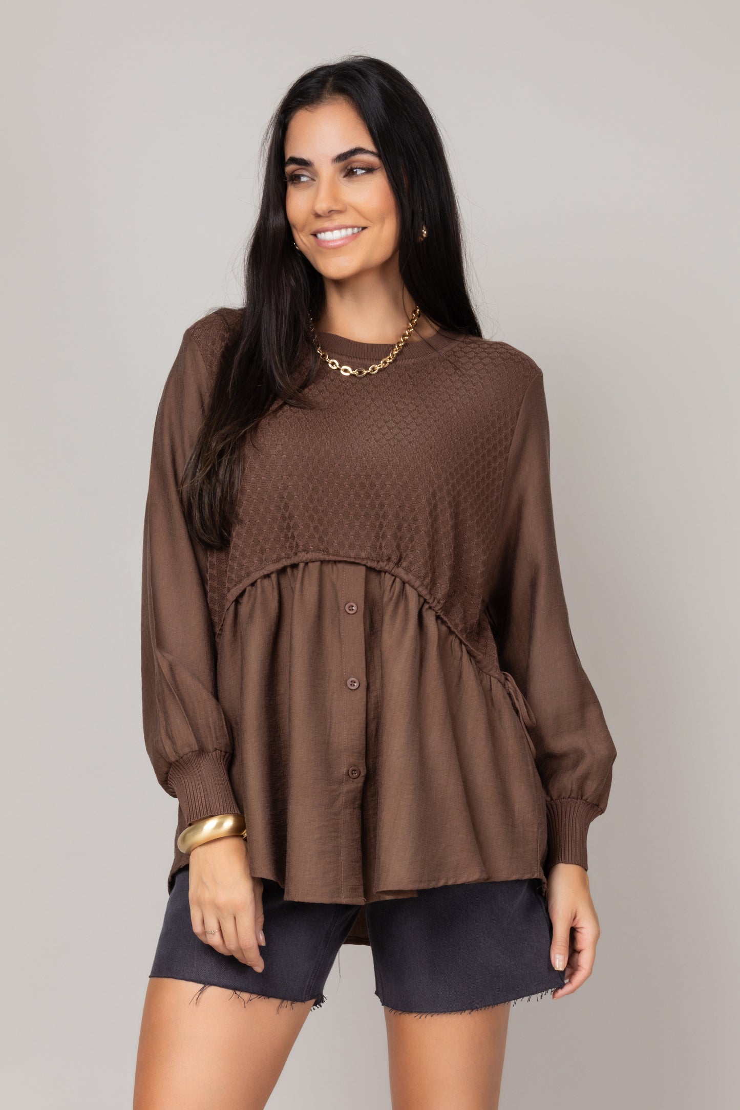 Blusa texturizada com mangas amplas