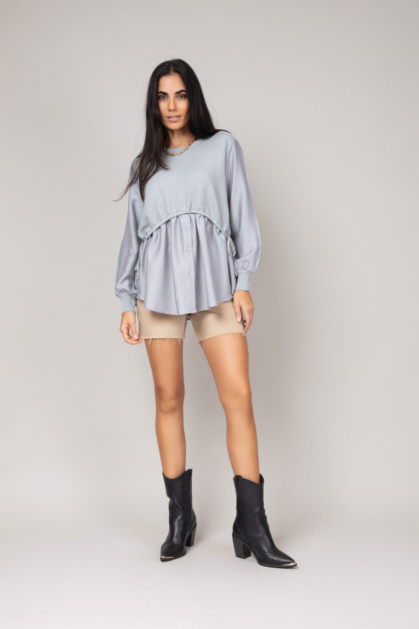 Blusa texturizada com mangas amplas