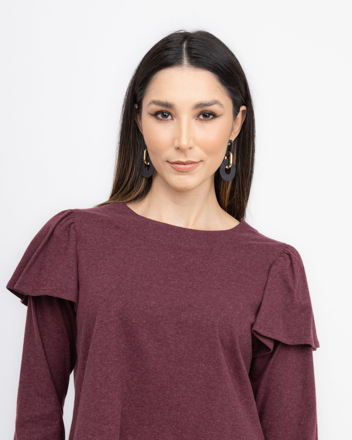 Blusa com manga longa e detalhes em babado