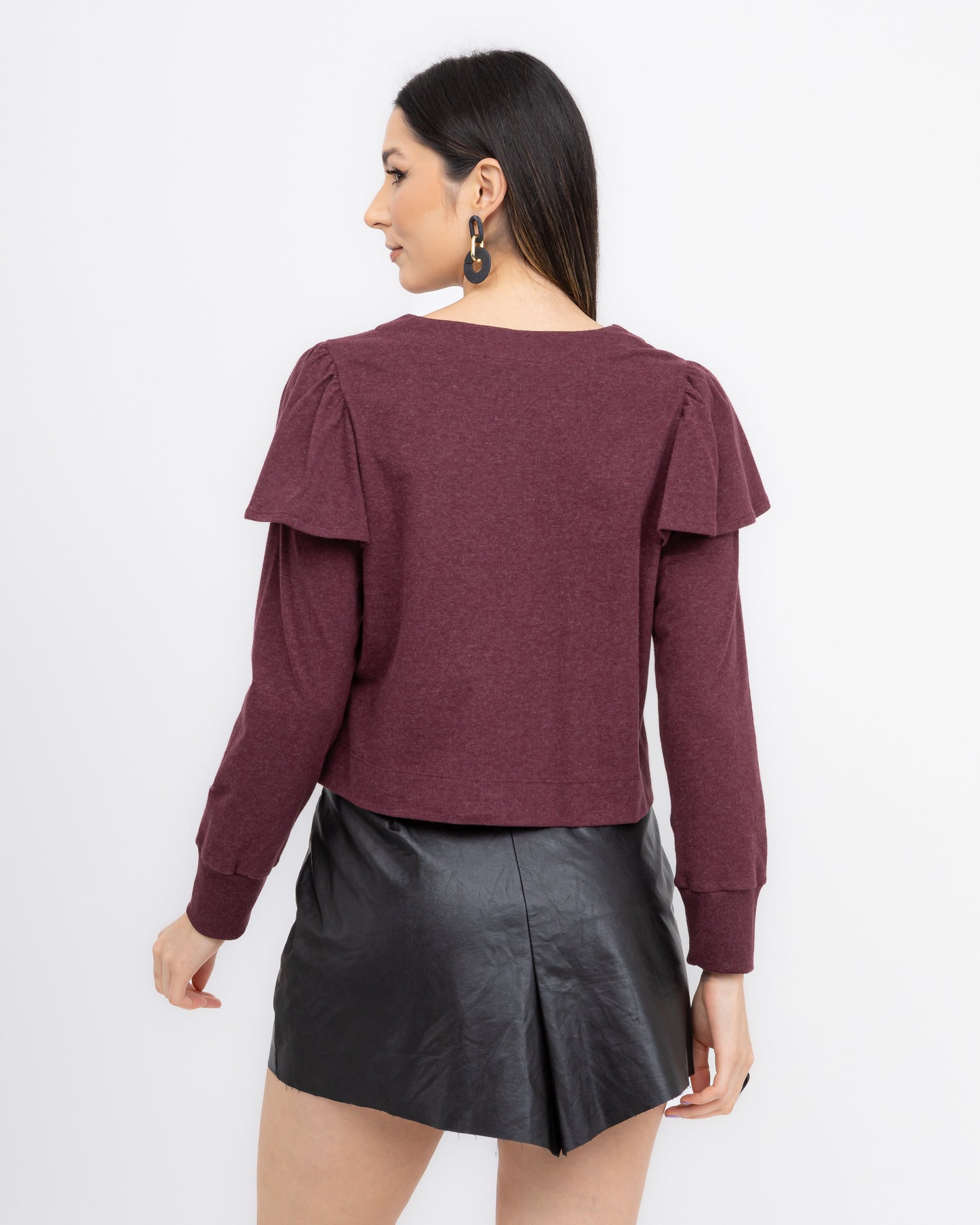 Blusa com manga longa e detalhes em babado