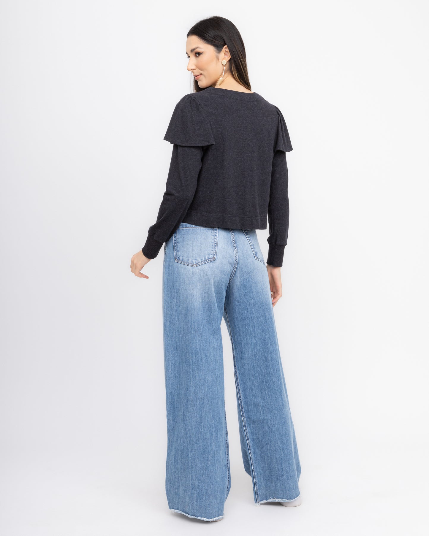 Blusa com manga longa e detalhes em babado