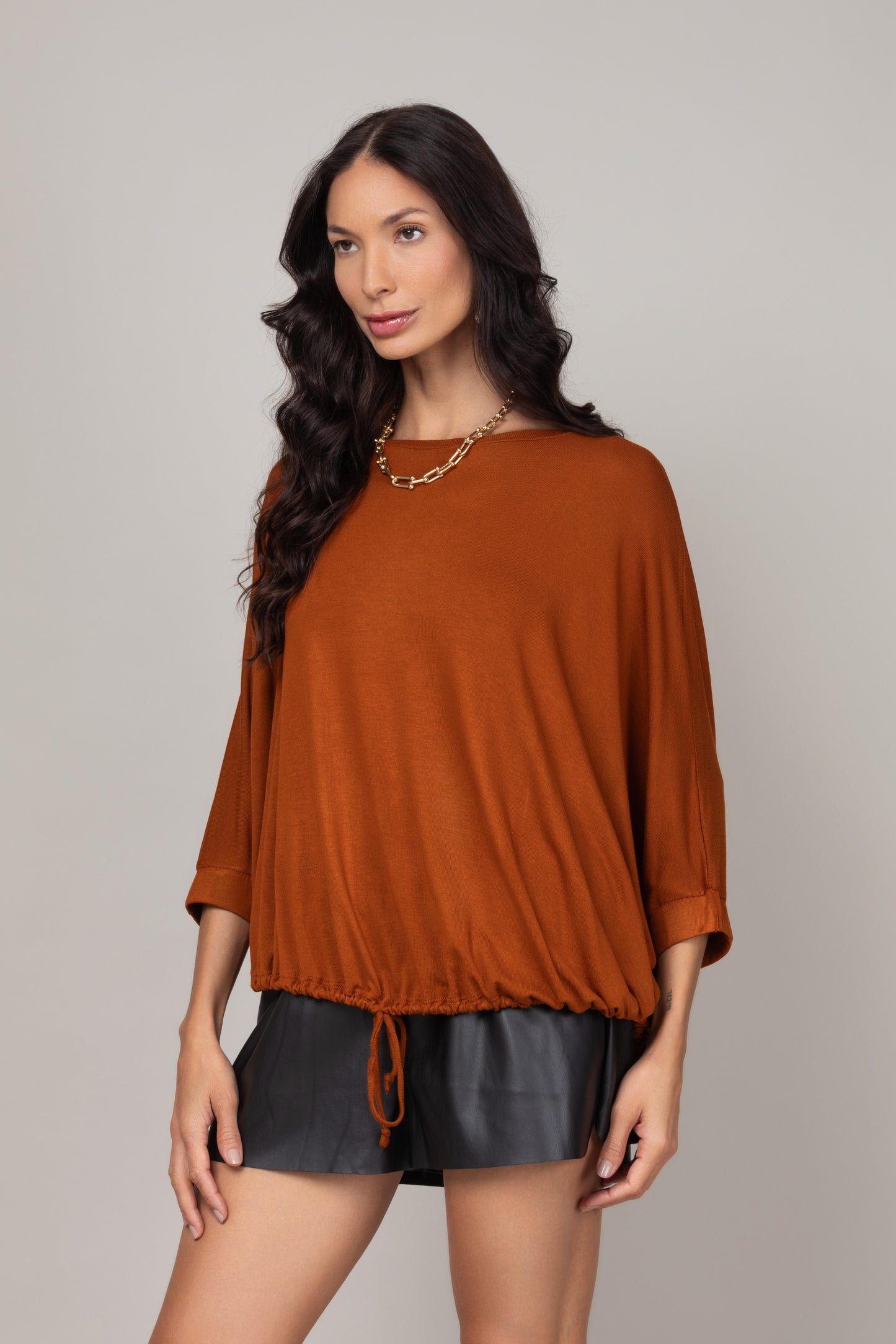 Blusa ampla com ajuste na barra