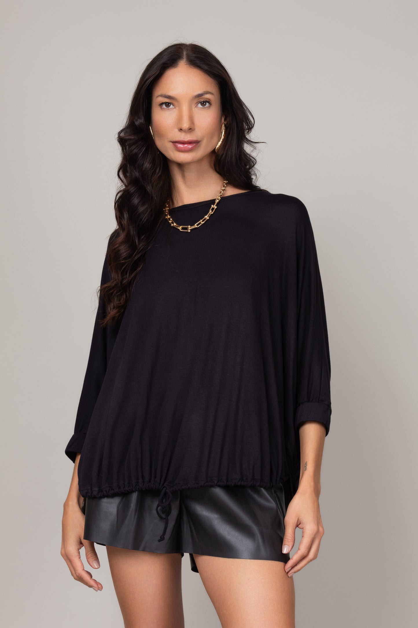 Blusa ampla com ajuste na barra