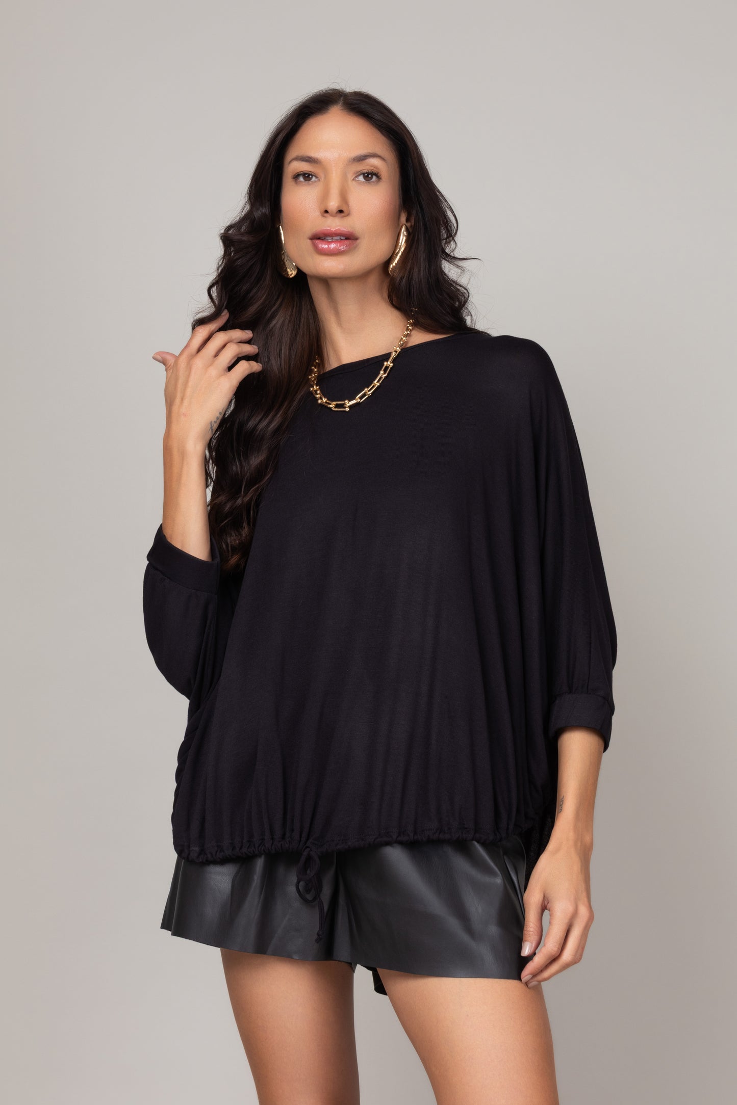 Blusa ampla com ajuste na barra