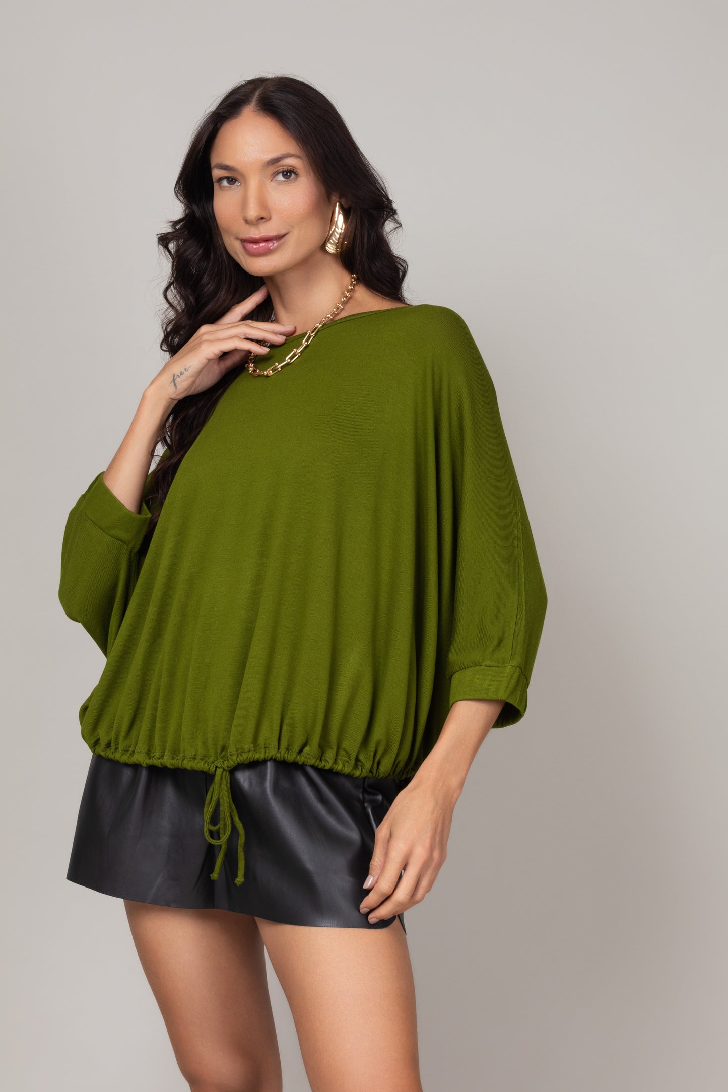 Blusa ampla com ajuste na barra
