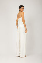 Conjunto blusa com zíper e calça pantalona off white - vista lateral