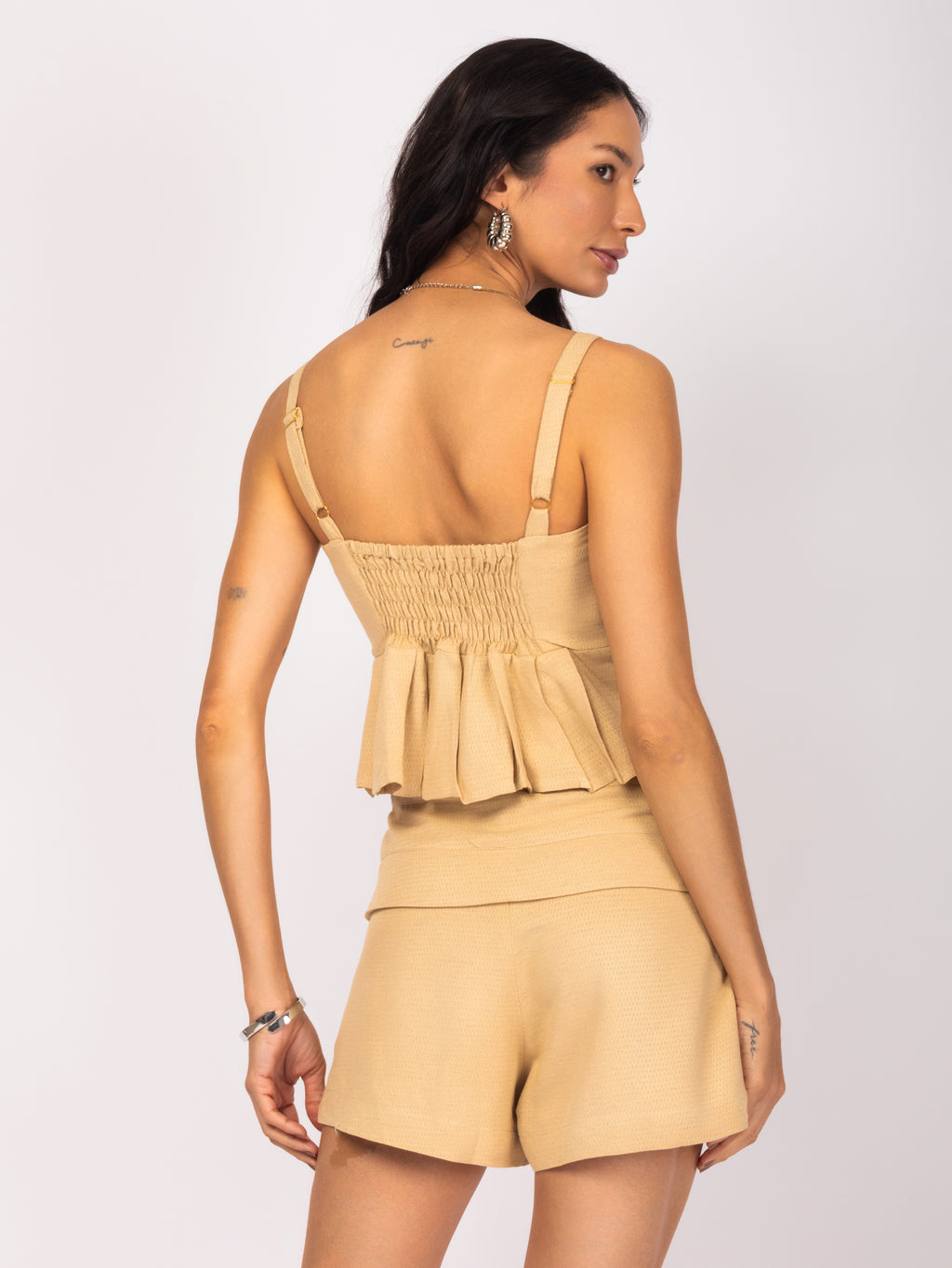 Cropped peplum em tecido texturizado