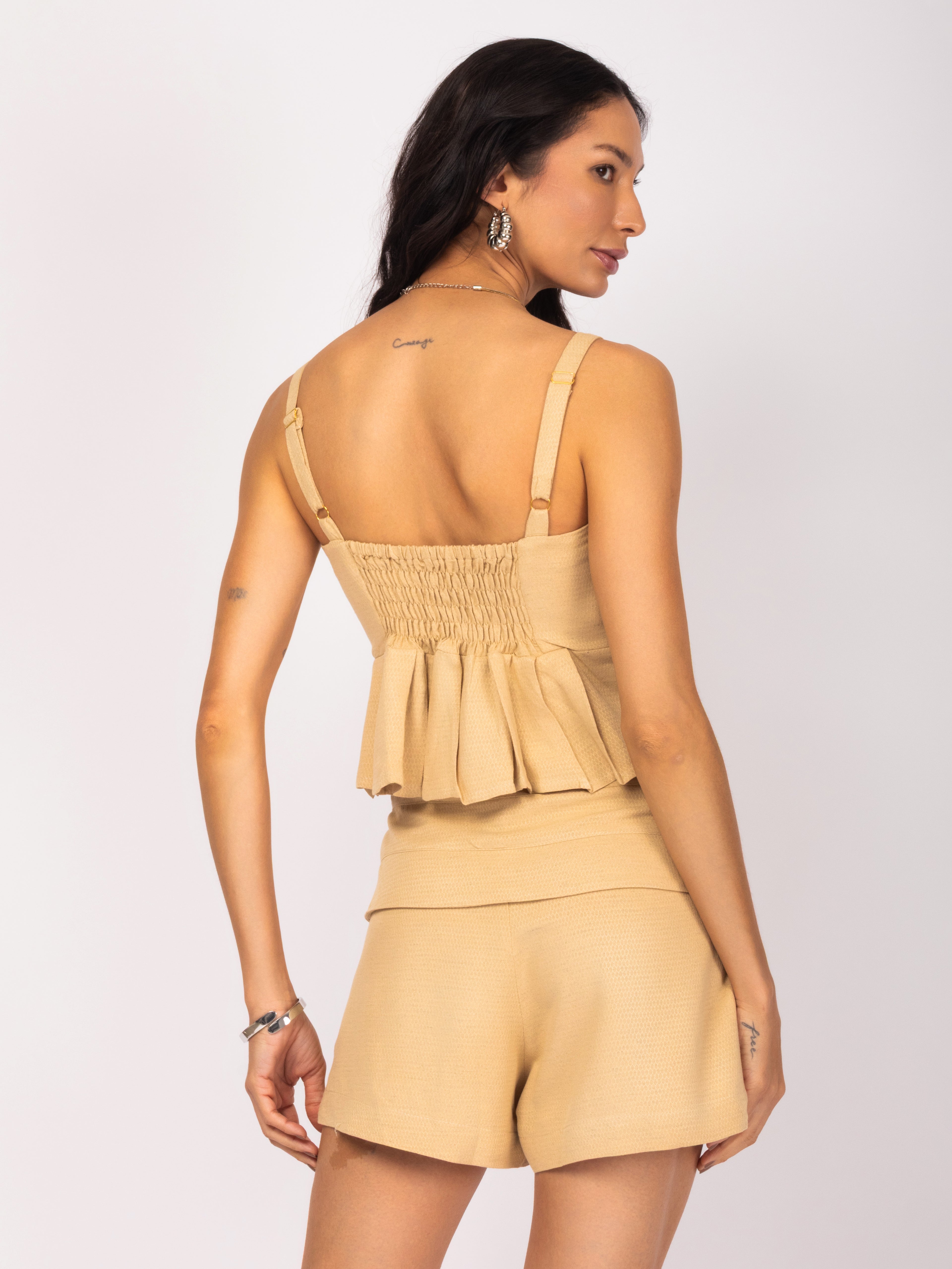 Cropped peplum em tecido texturizado