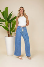 Calça jeans wide leg poá