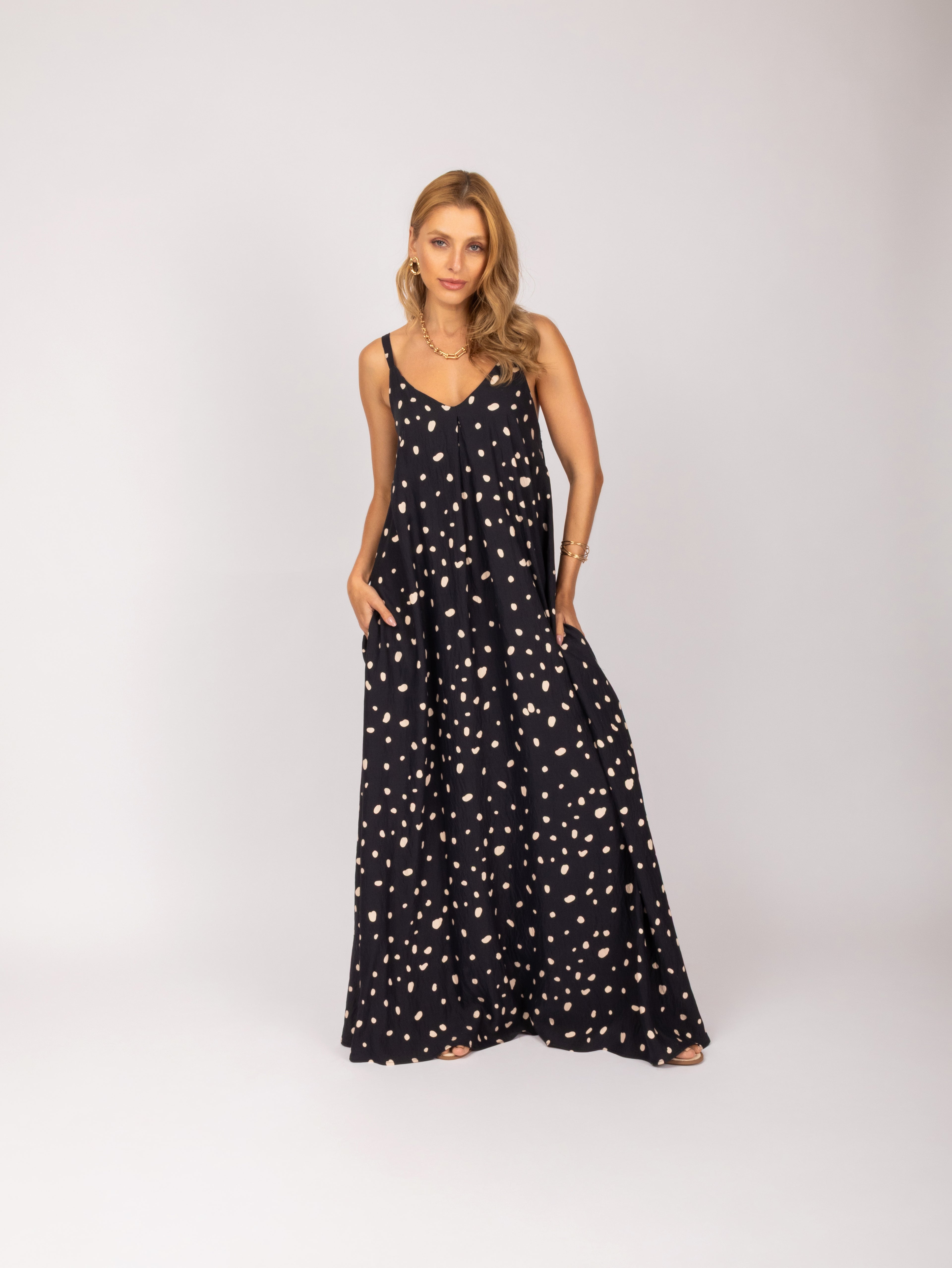 Vestido longo com estampa de poa