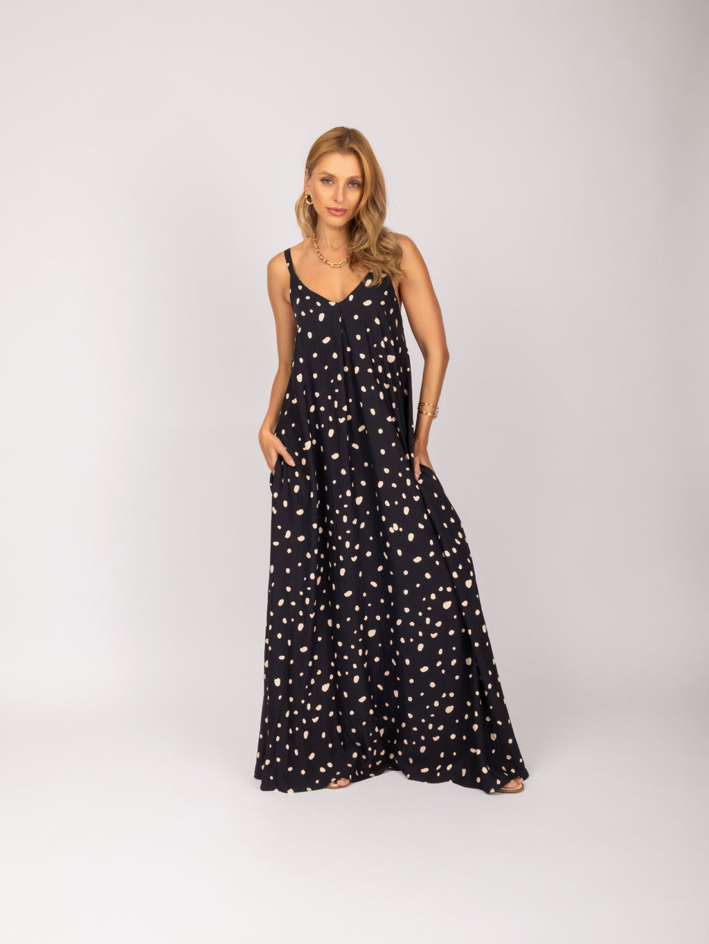 Vestido longo com estampa de poa