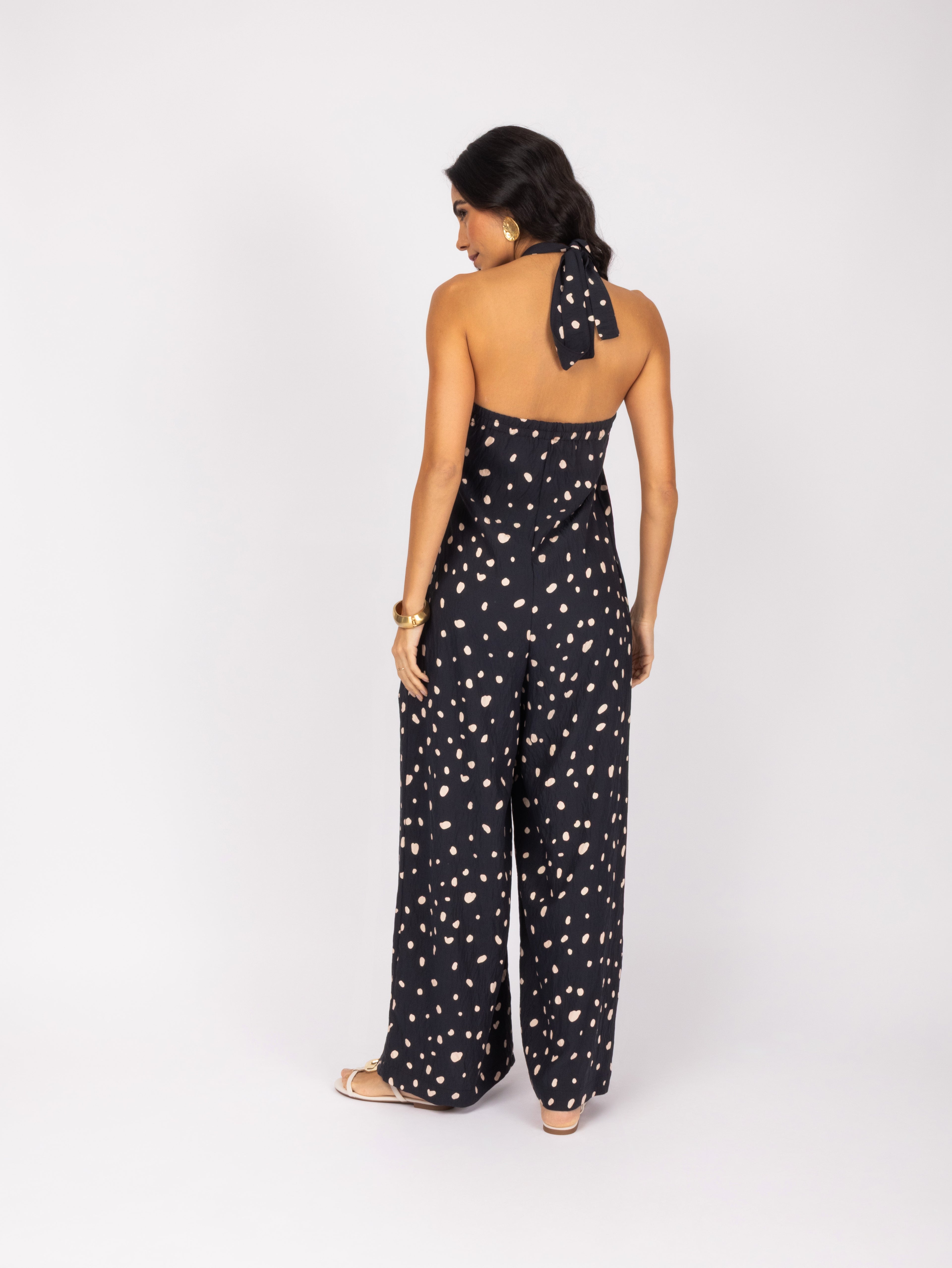 Macacão pantalona halter estampado poá
