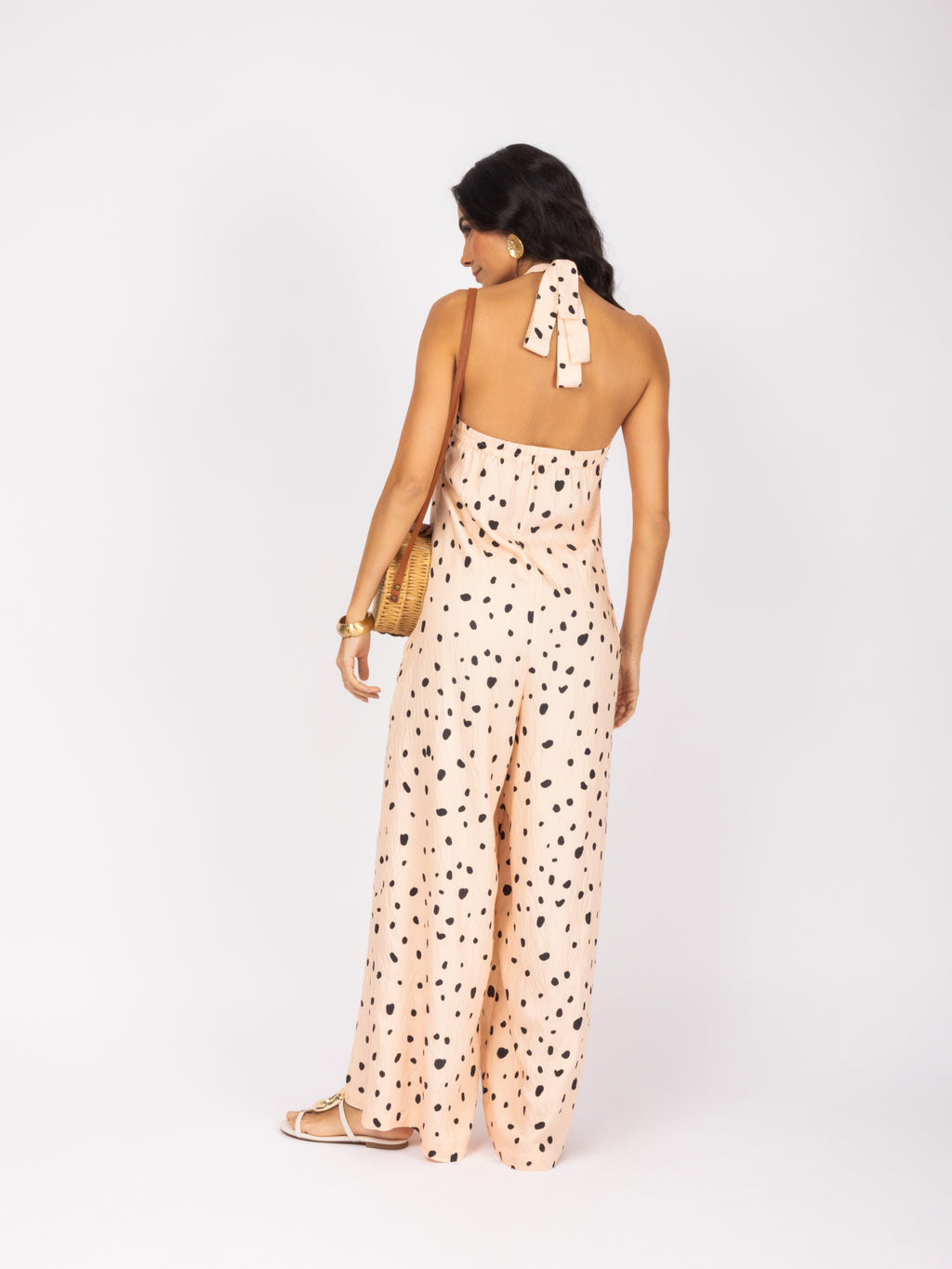 Macacão pantalona halter estampado poá
