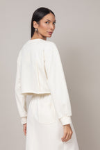 Conjunto de blusa cropped e saia