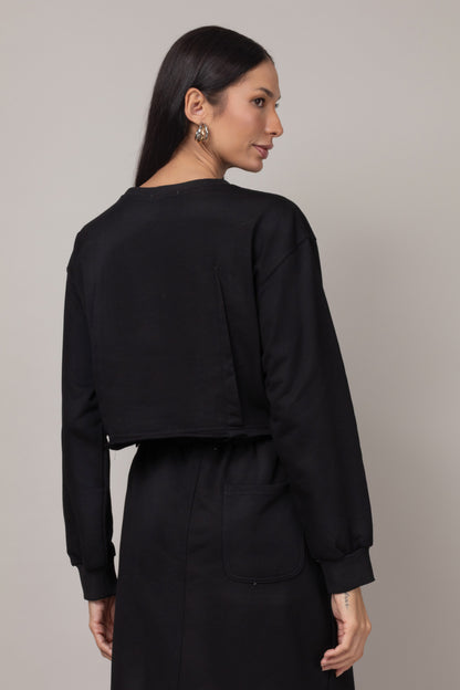 Conjunto de blusa cropped e saia