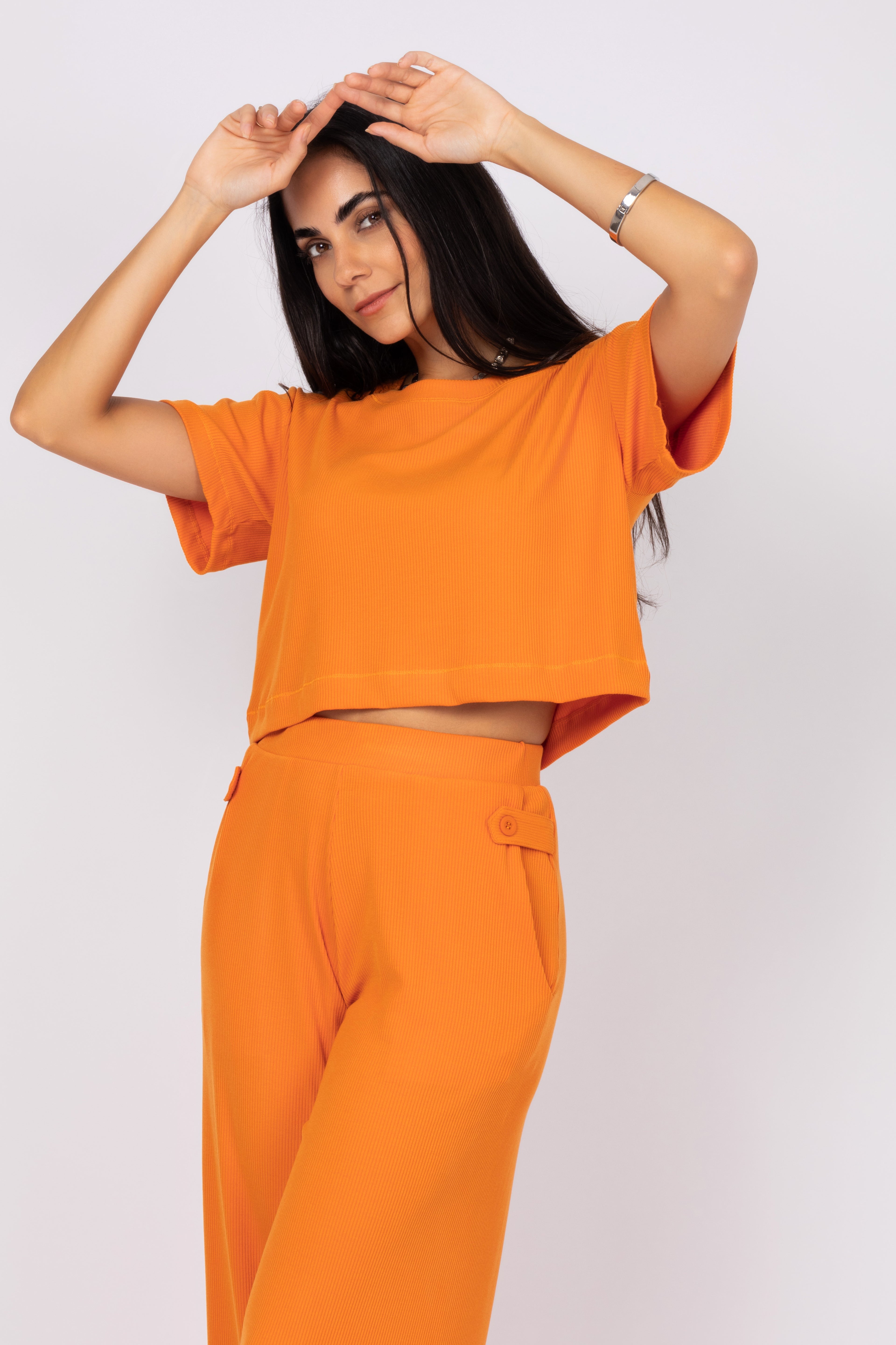 Conjunto cropped e calça pantalona canelada