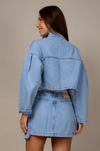 Saia curta jeans com bolsos