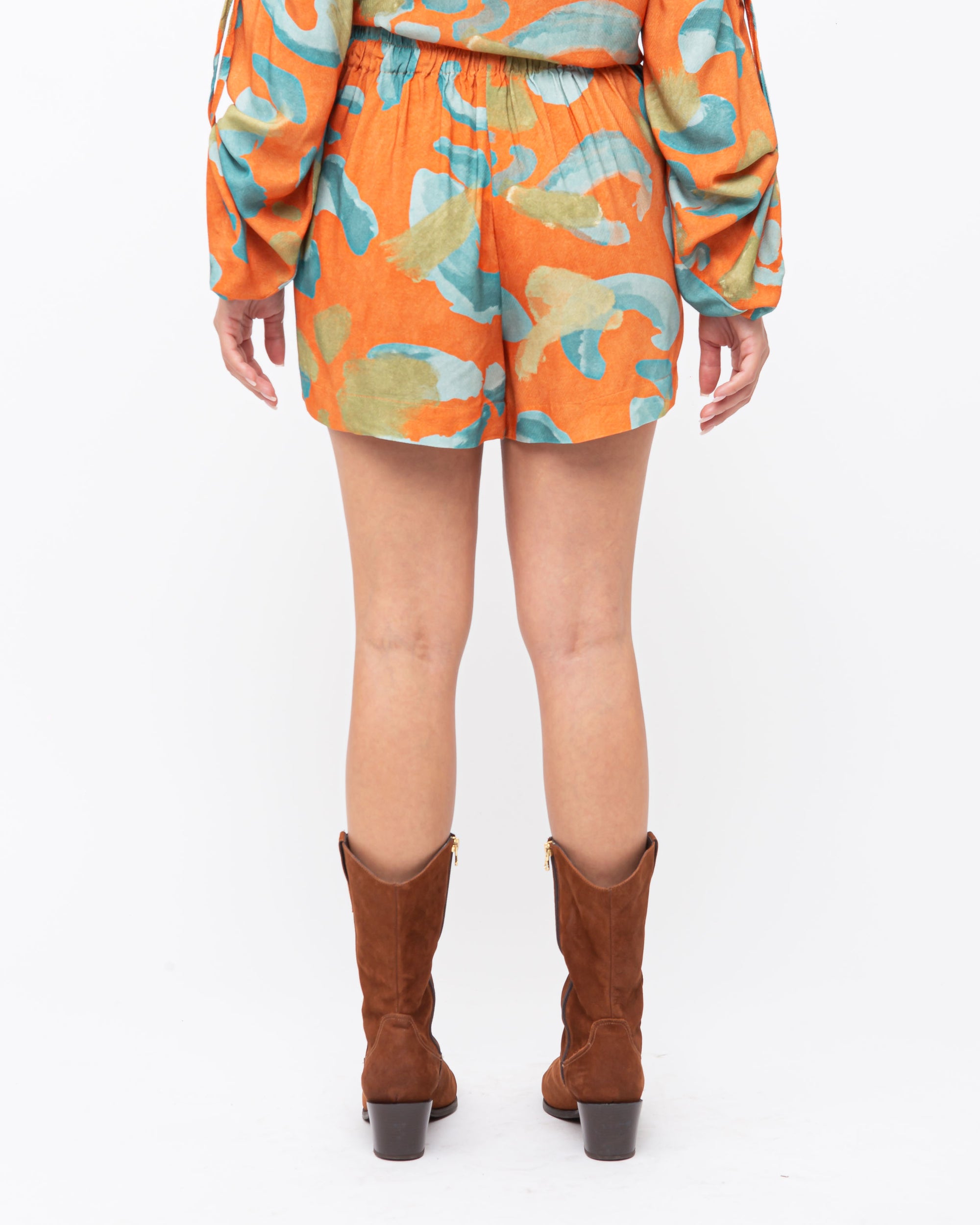 Shorts saia viscose estampa animal print laranja