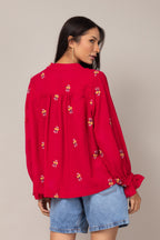 Bata com detalhes florais