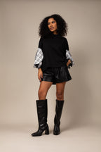 Blusa oversized com manga xadrez