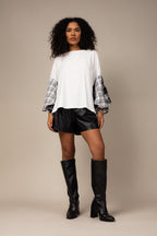 Blusa oversized com manga xadrez