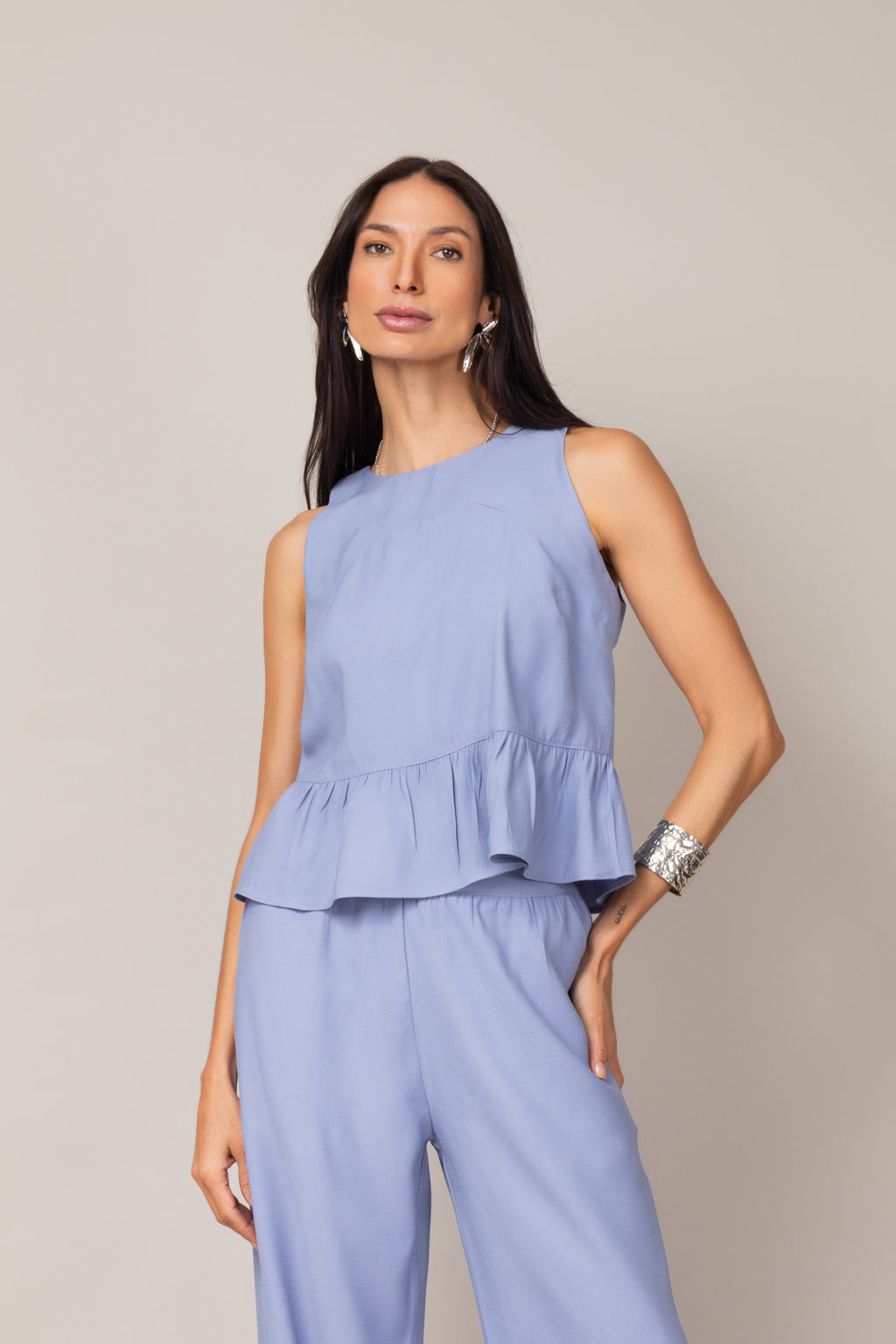 Conjunto com blusa peplum e calça pantalona