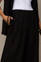 Calça alfaiataria com cinto