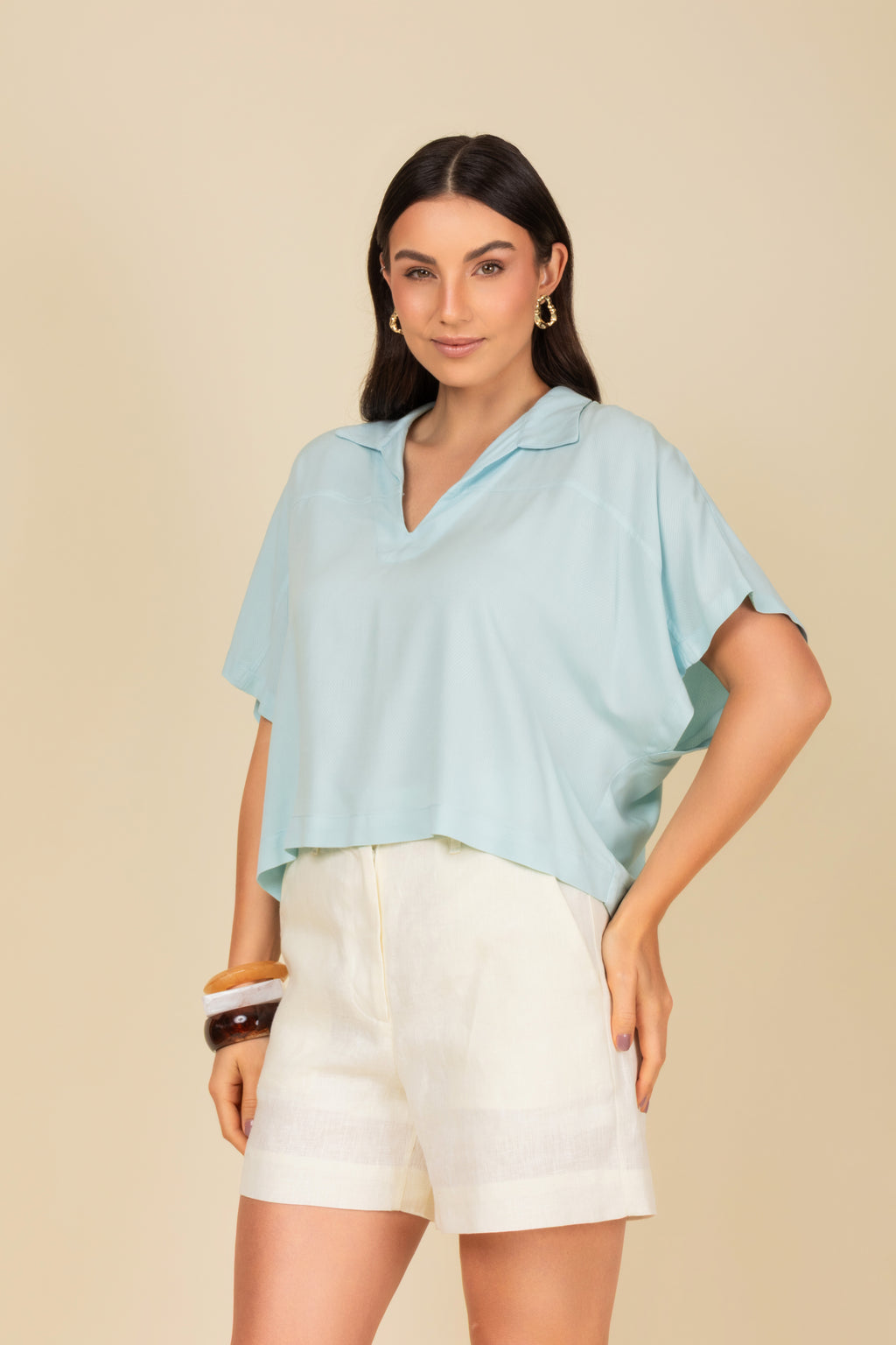 Blusa polo cropped em malha