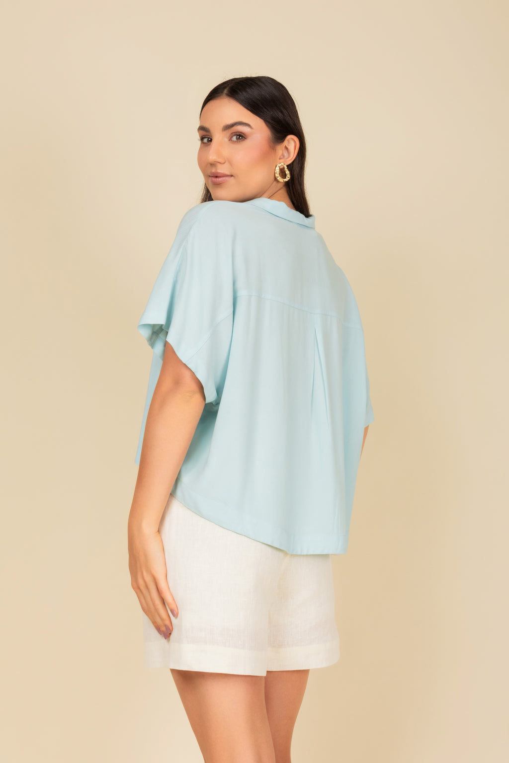 Blusa polo cropped em malha