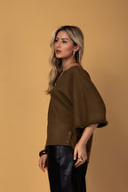 Blusa manga 3/4 e detalhes em franjas