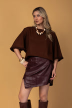 Blusa manga 3/4 e detalhes em franjas