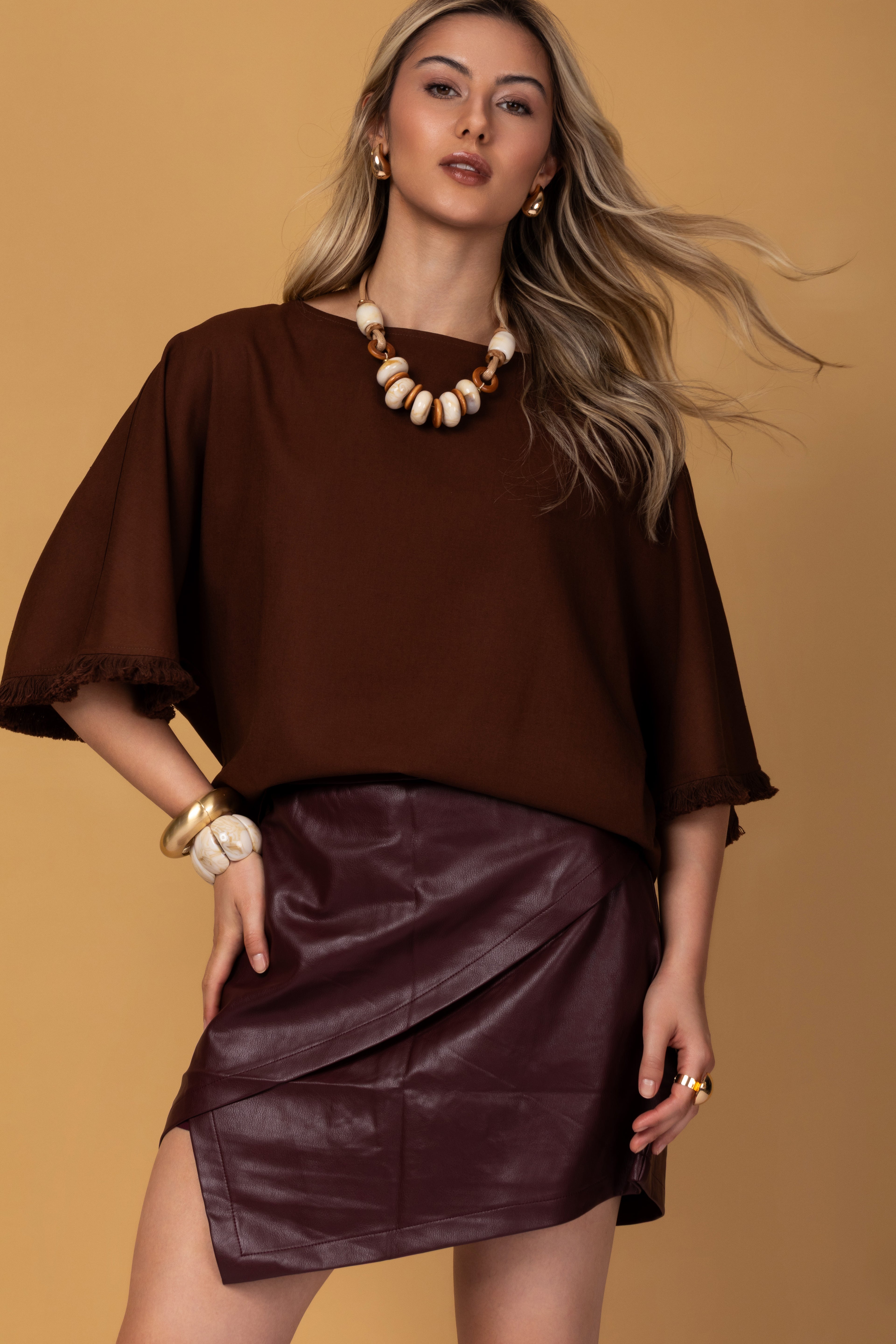 Saia de couro eco transpassada