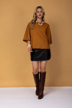 Blusa manga 3/4 e detalhes em franjas