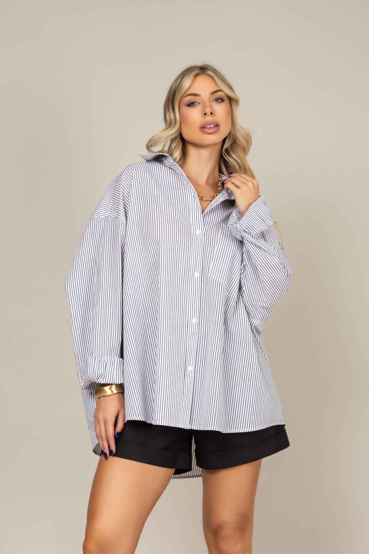 Camisa oversized listrada