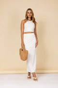 Conjunto canelado com cropped e saia longa com fenda