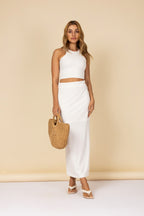Conjunto canelado com cropped e saia longa com fenda