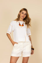 Blusa malha com recortes contrastantes