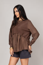 Blusa texturizada com mangas amplas