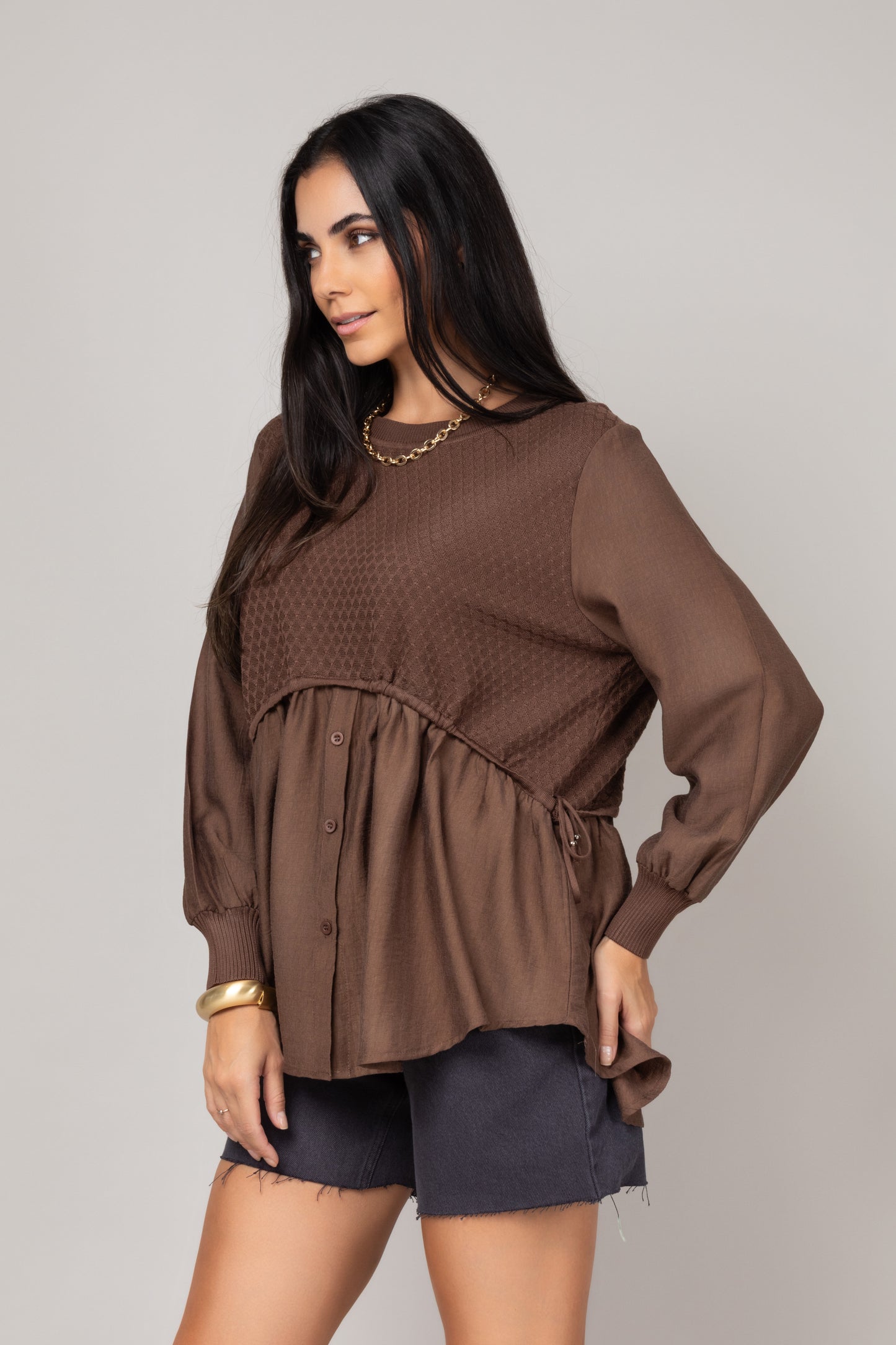 Blusa texturizada com mangas amplas