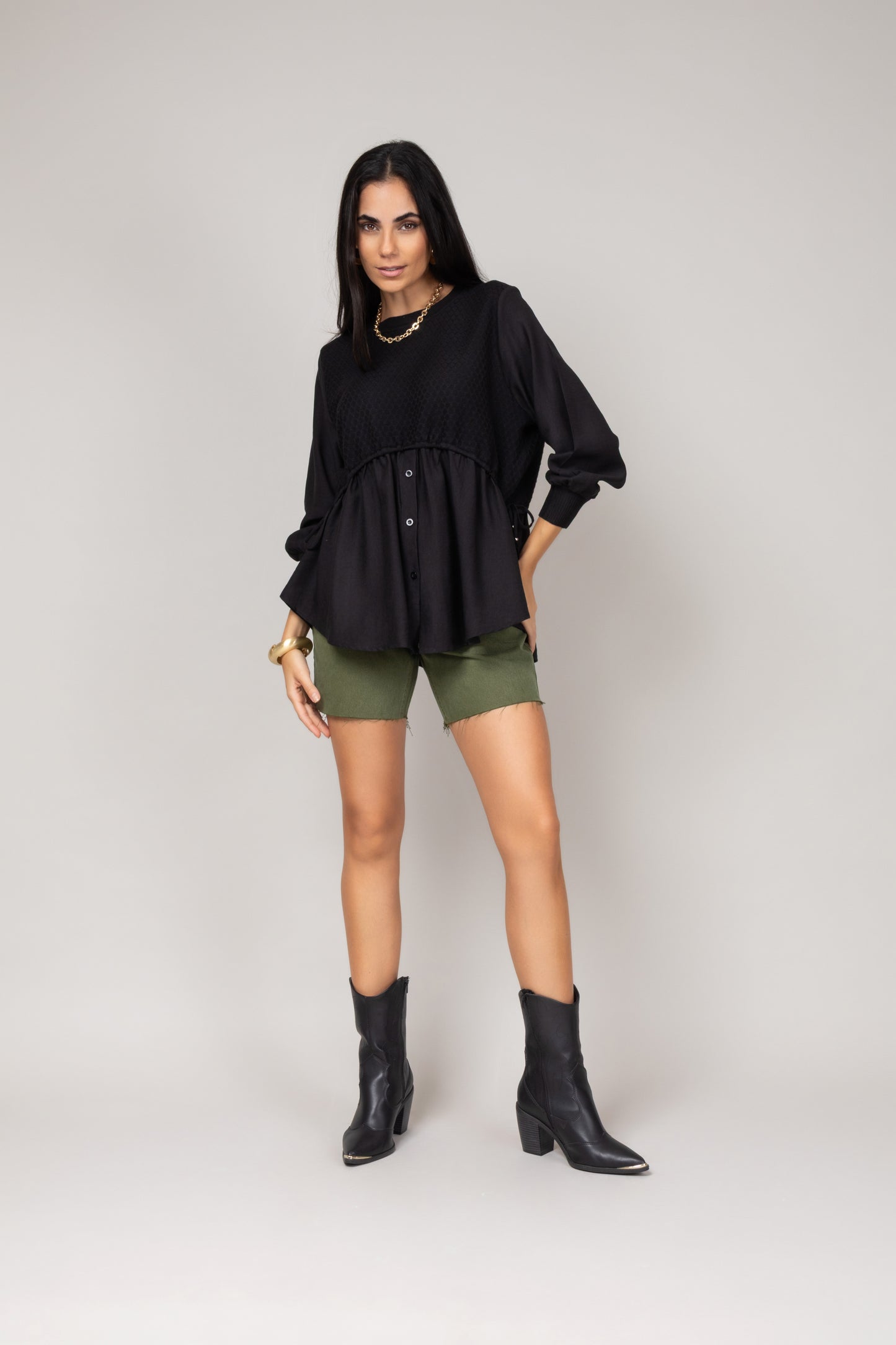 Blusa texturizada com mangas amplas