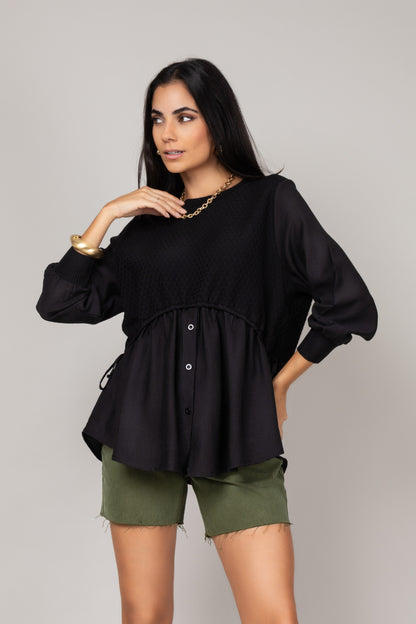 Blusa texturizada com mangas amplas