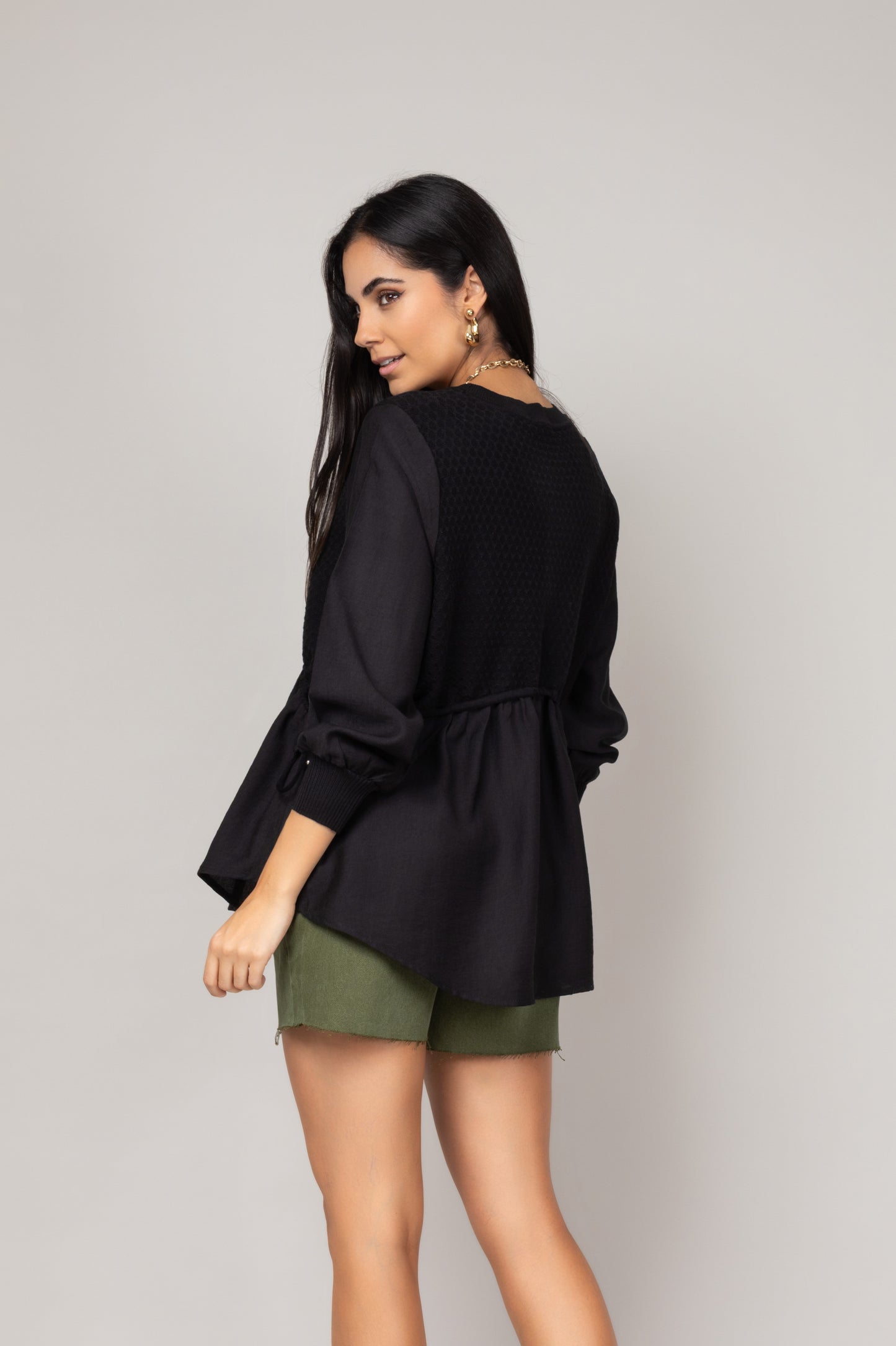 Blusa texturizada com mangas amplas