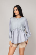 Blusa texturizada com mangas amplas