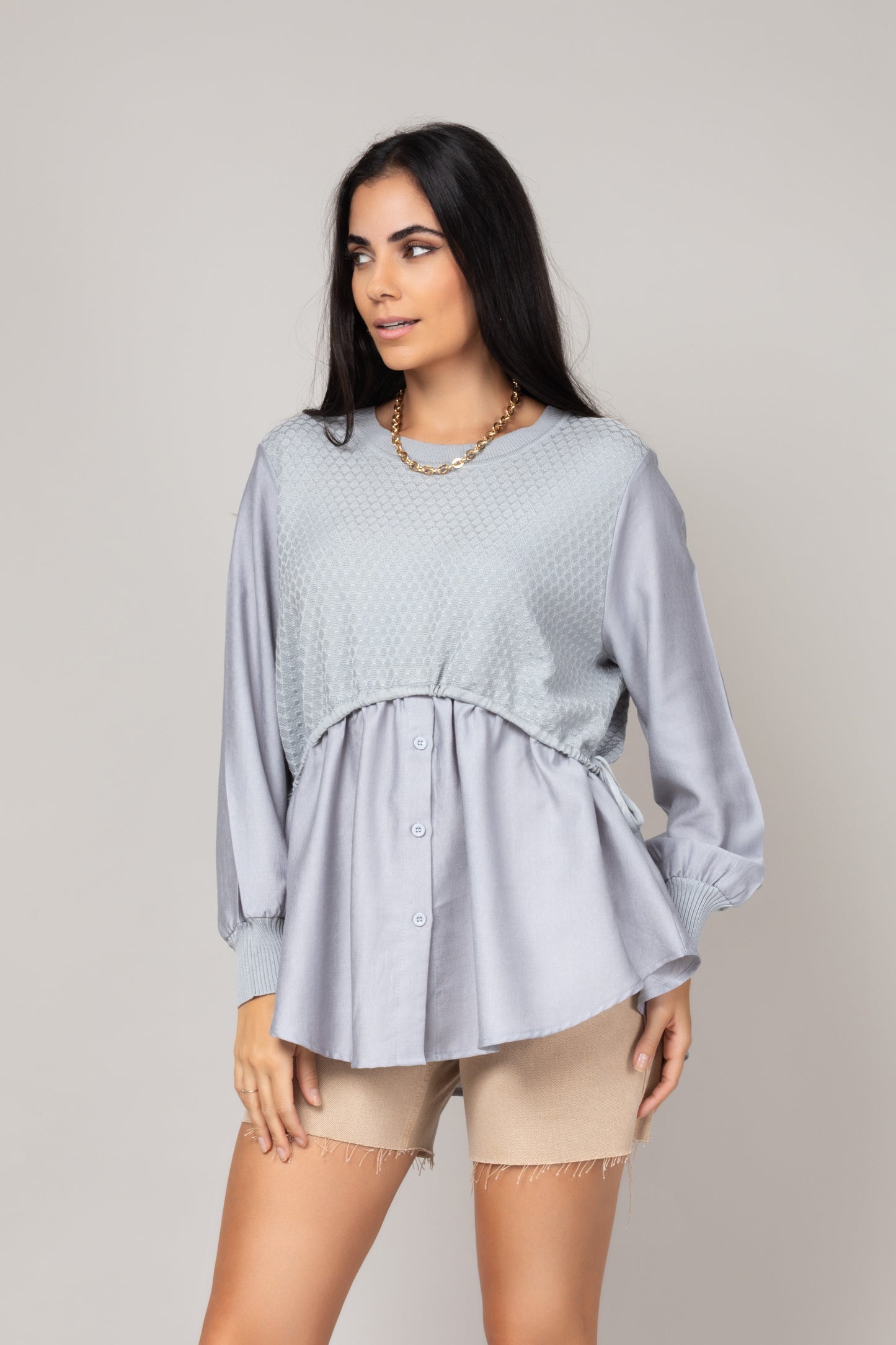 Blusa texturizada com mangas amplas