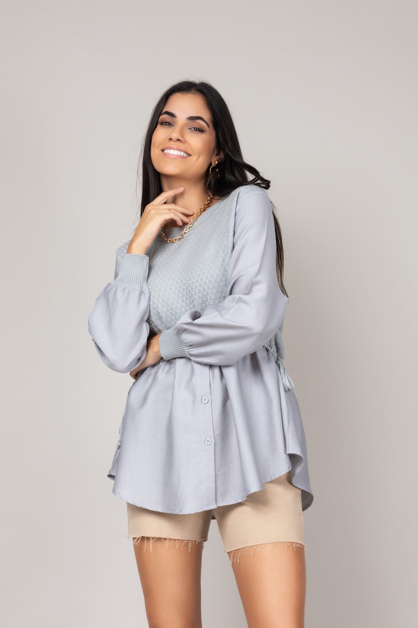 Blusa texturizada com mangas amplas
