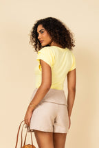 Short saia em tecido texturizado