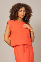 Conjunto saia midi com blusa em malha