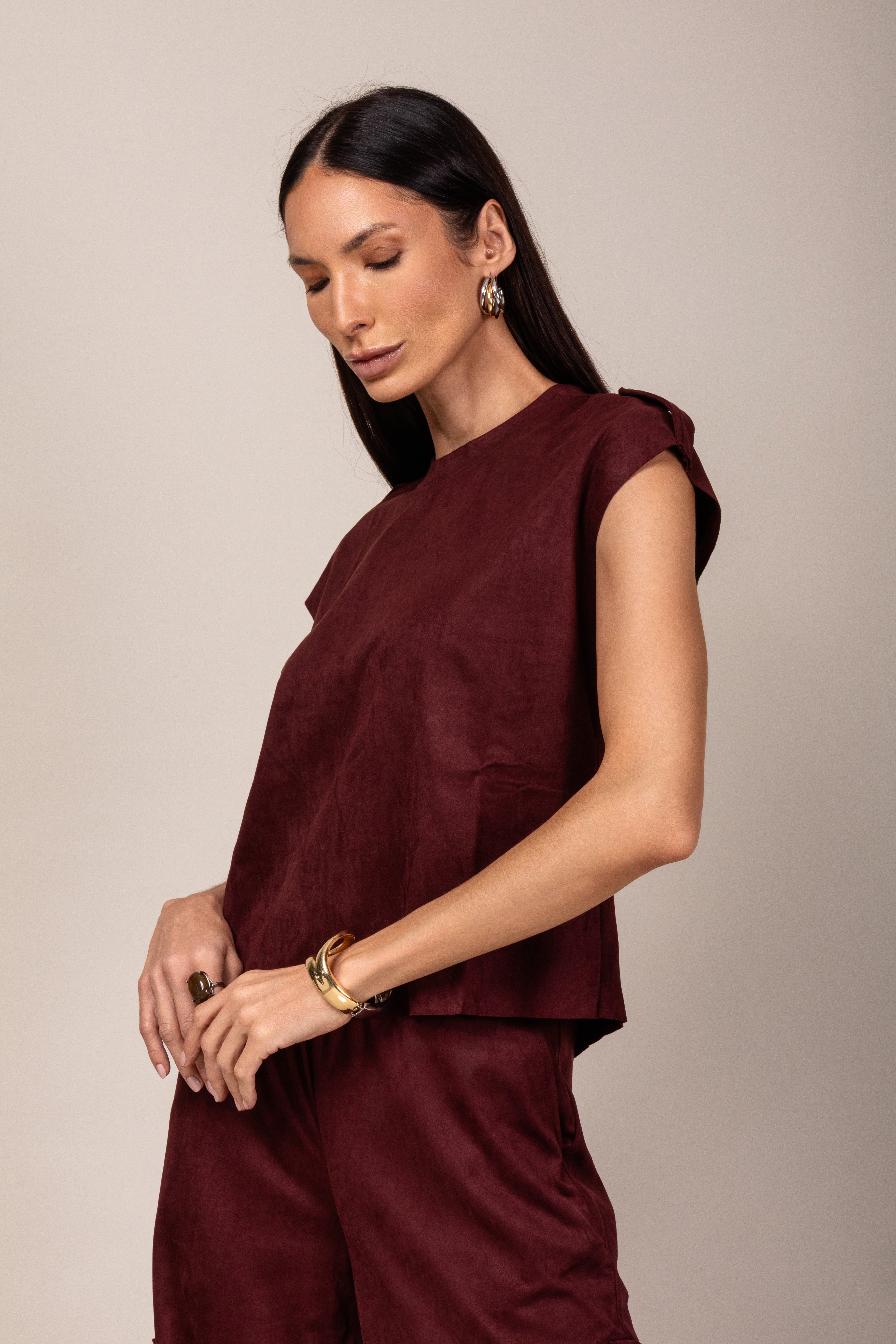 Regata com martingale em camurça