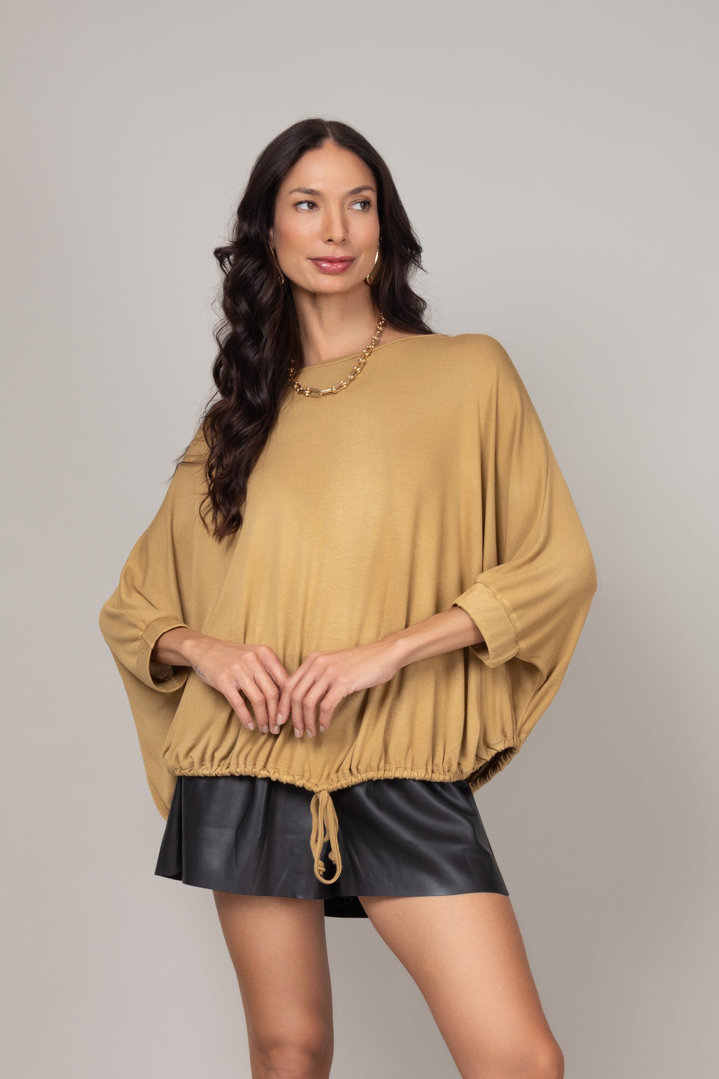 Blusa ampla com ajuste na barra
